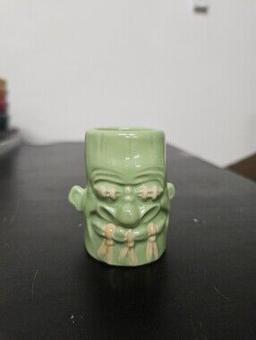 Tiki Farm Sam's Dinky Noggin Purple Shrunken Head Shotglass by Sam Gambino 2005